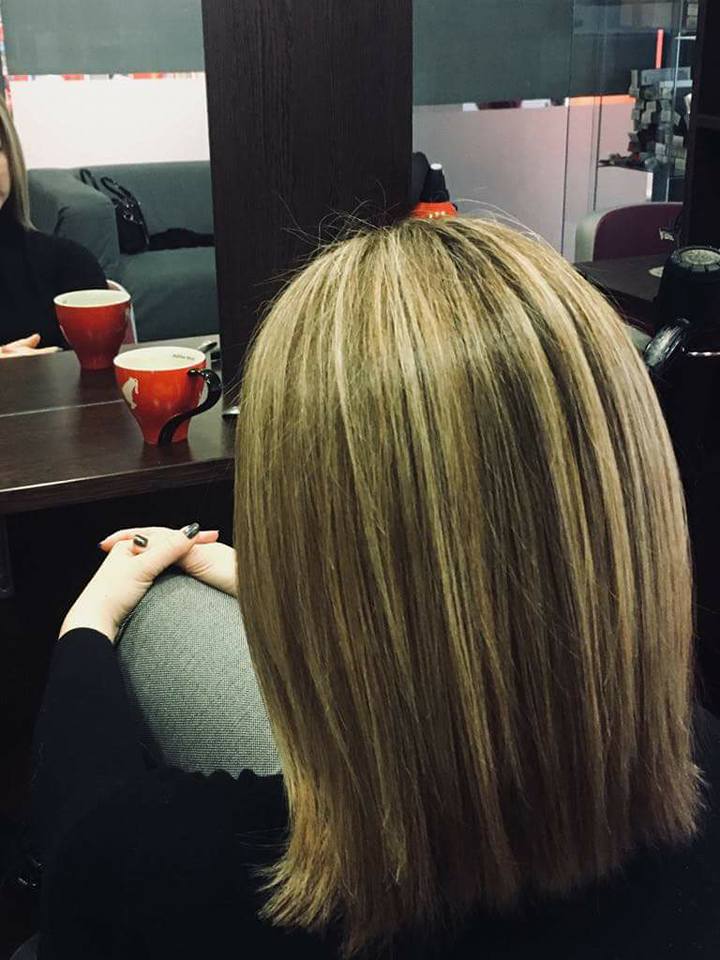 Blonde hair cut in a salon