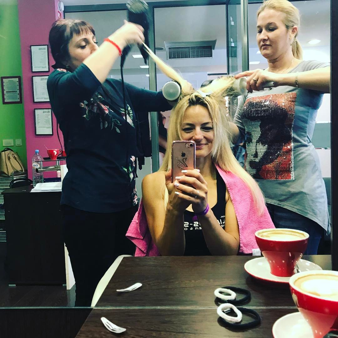 Hair styling session in a salon