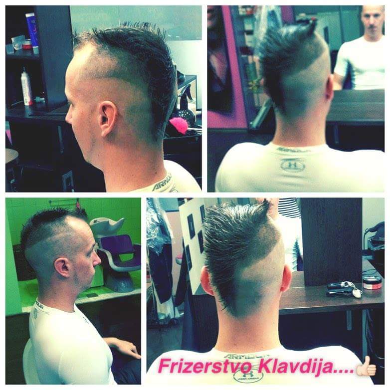 A man with a modern haircut in a barbershop setting