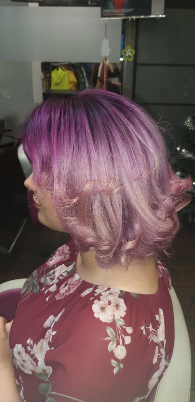 Vibrant purple wavy bob hairstyle